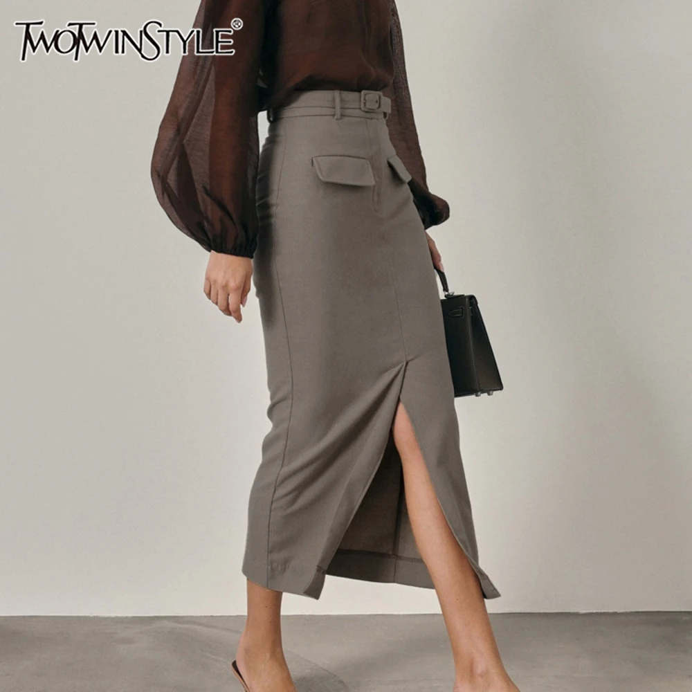 kf-S51889be302244214b65f68351b7fa1cfU TWOTWINSTYLE Office Patchwork Pockets Midi Skirts for Women High Waist Spliced Sashes Front Slit Minimalist Style Skirt Female - Image 1